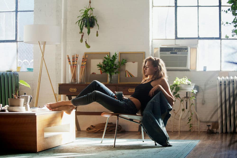 a-woman-relaxing-with-her-feet-up