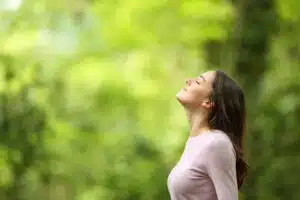 a girl meditating in nature
