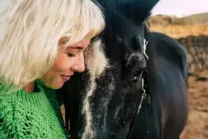 a-woman-hugging-a-horse