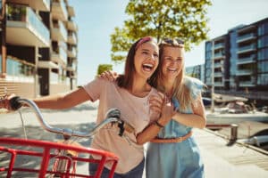 two-women-laughing-enjoying-the-summer-day