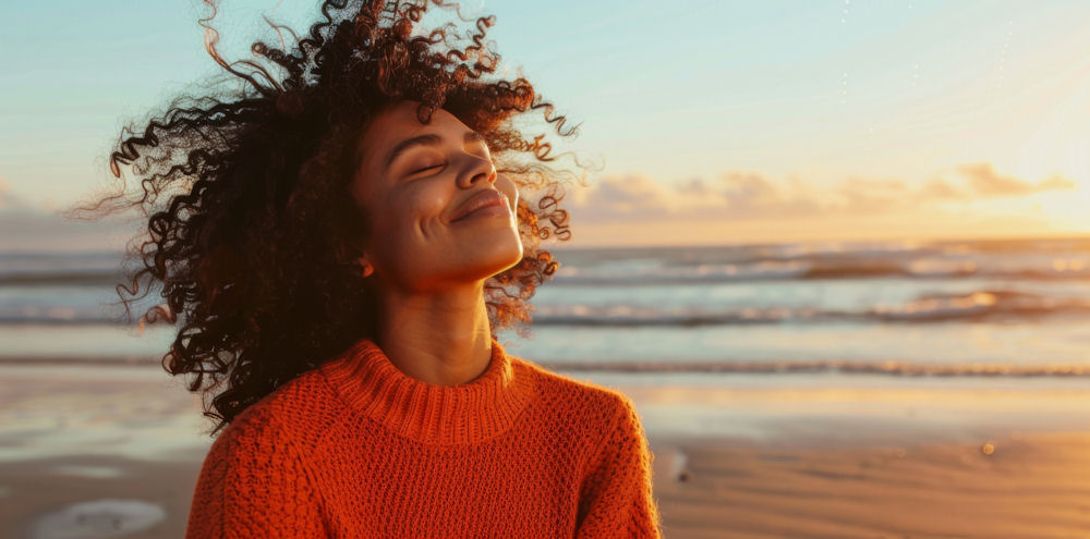 a-black-woman-at-peace-on-the-beach