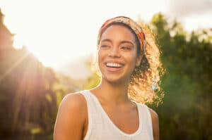 a-woman-smiling-celebrating-her-sober-birthday