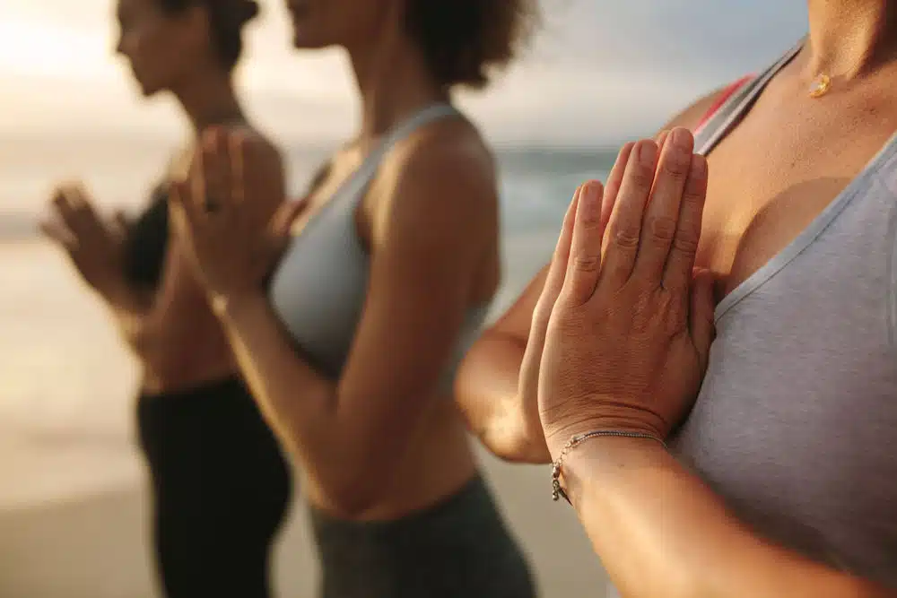 group-of-women-healing-the-body-through-yoga