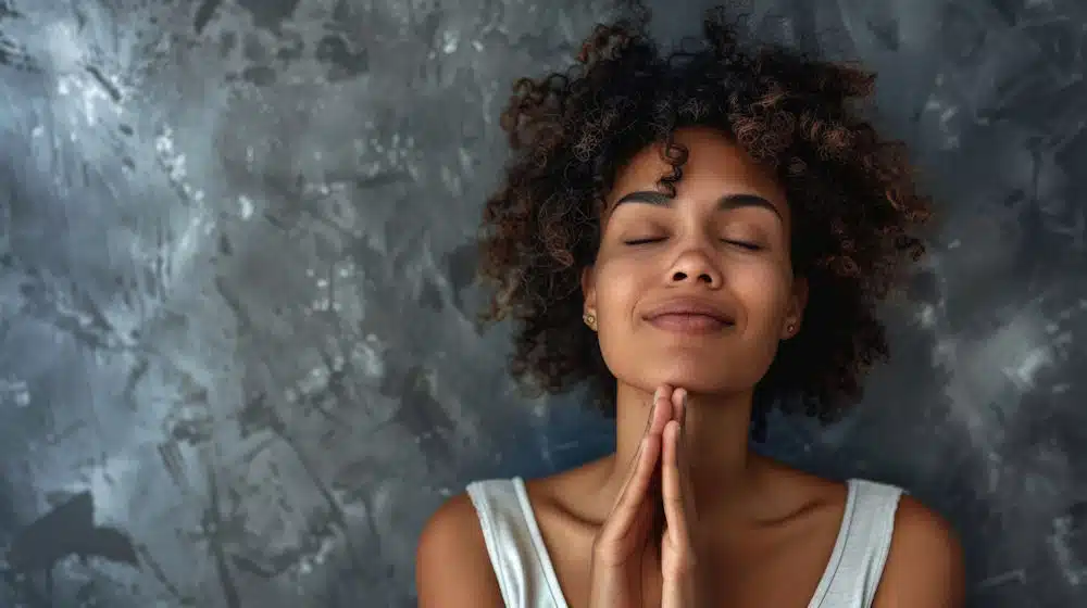 woman-with-eyes-closed-praying