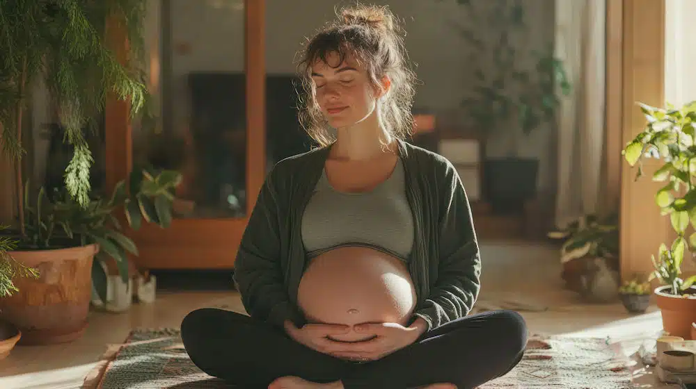 a-pregnant-woman-practicing-yoga-surrounded-by-plants